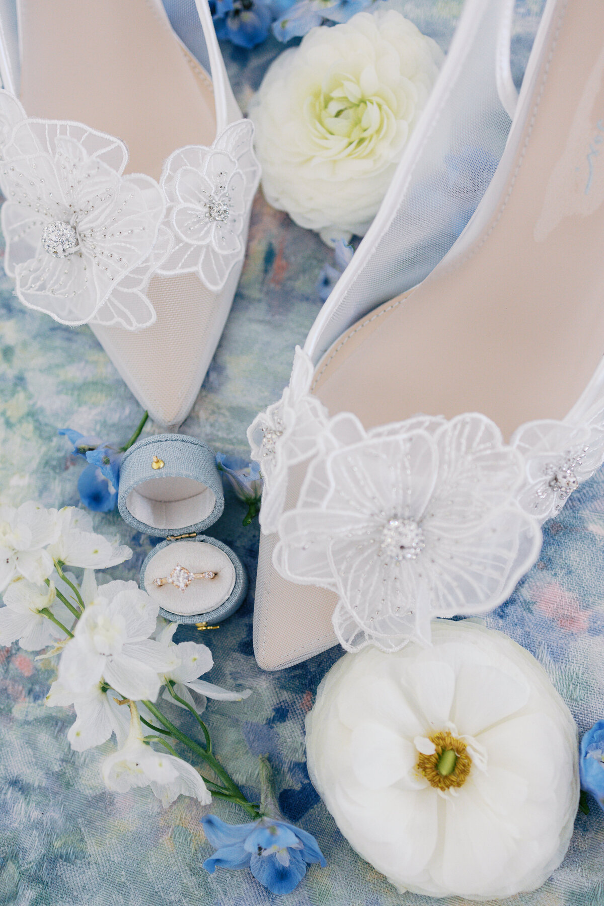 Floral bridal shoes and engagement ring
