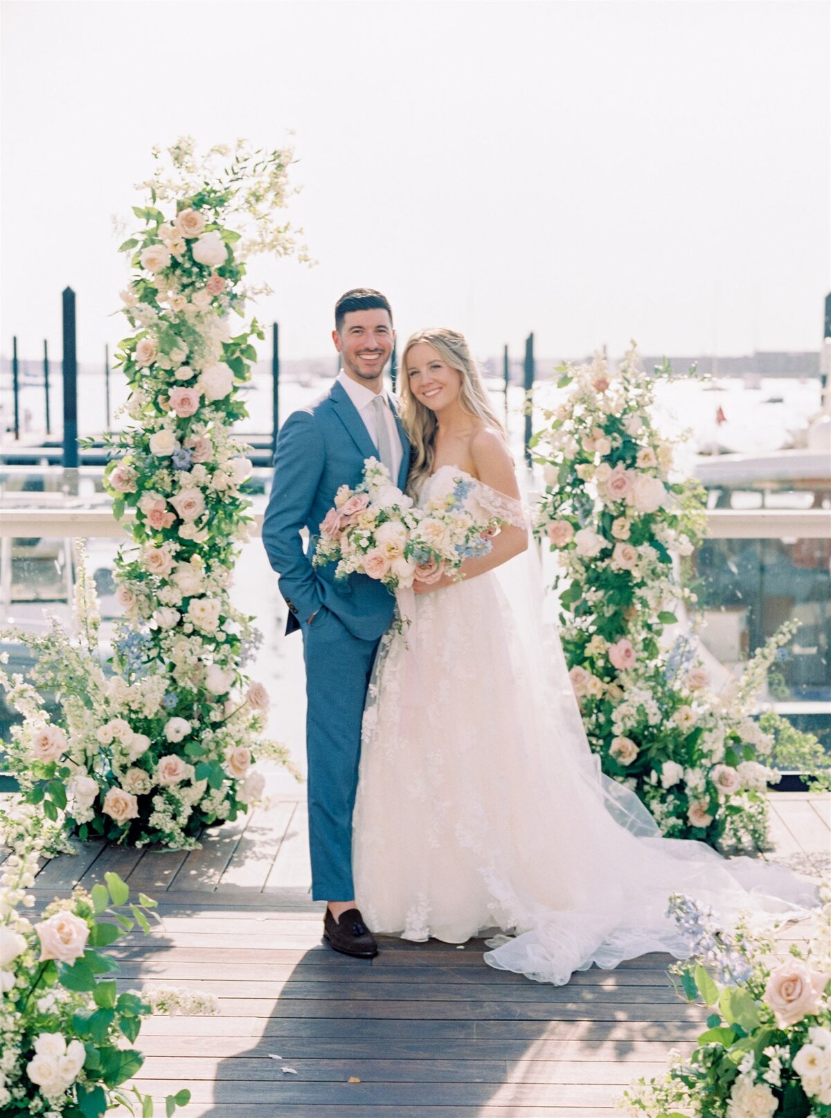 Kate-Murtaugh-Events-Newport-elopement-wedding-planner-couple-dock-altar-portrait-bride-groom