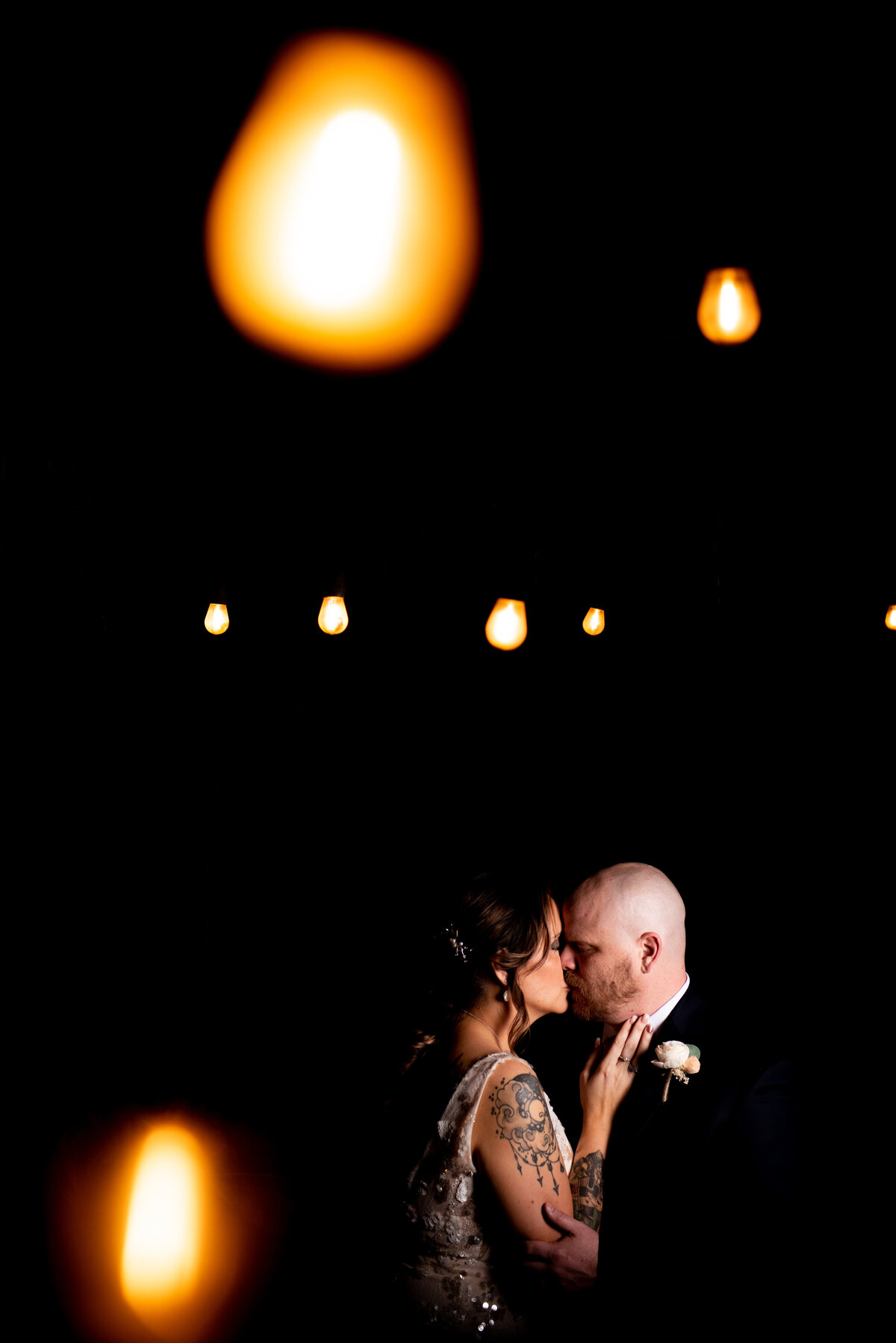 Bride and groom under the lights