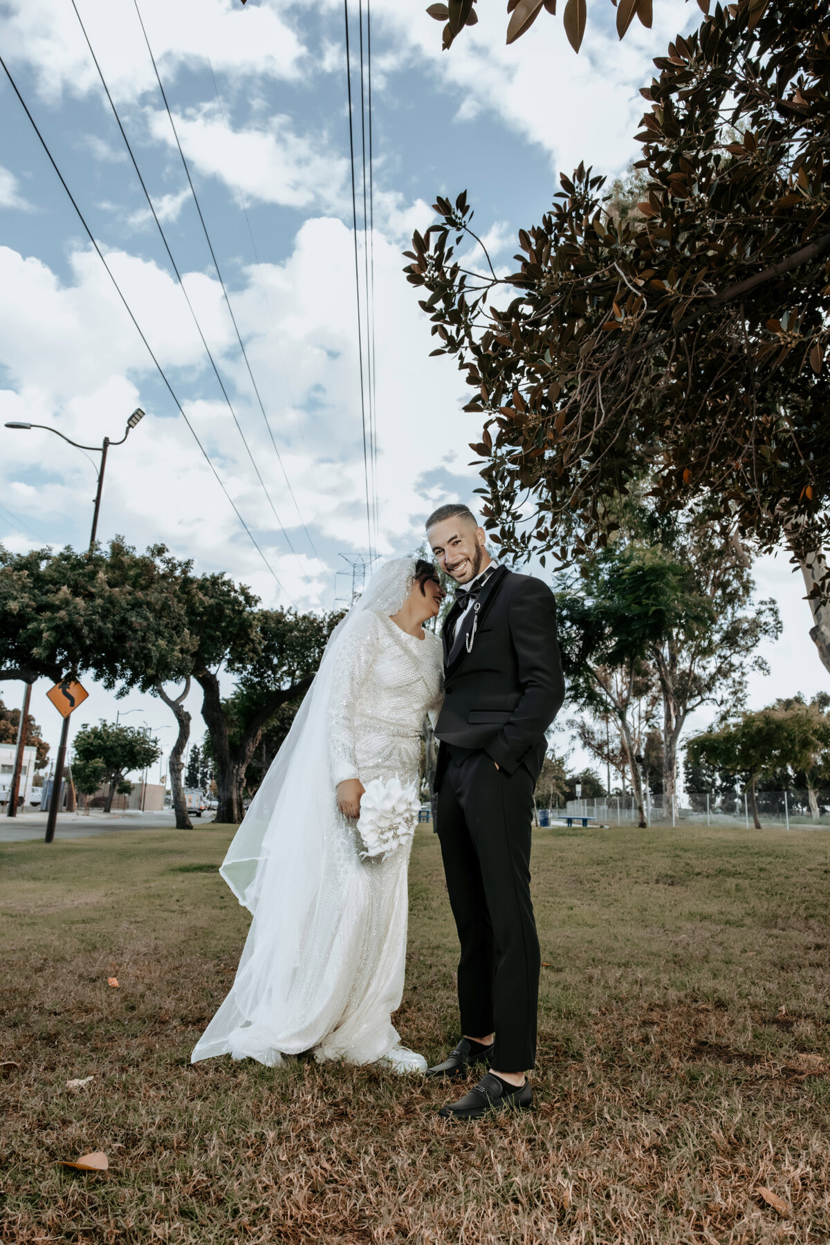 Bride and Groom Exchanging Smiles – LA Arabian Wedding Ceremony