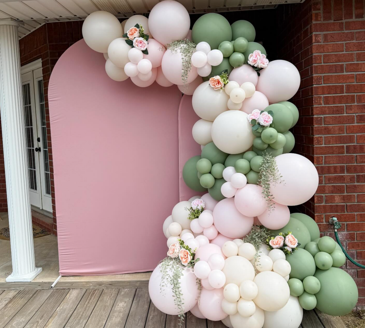 pastel balloons and flowers with custom pink backdrop for party in Ardmore, OK