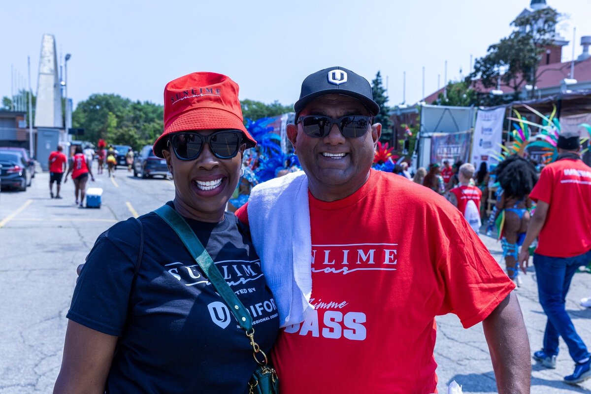 Toronto caribbean carnival parade masquerader in costume with Sunlime Mas, the number 1 medium size band at Toronto Carnival.