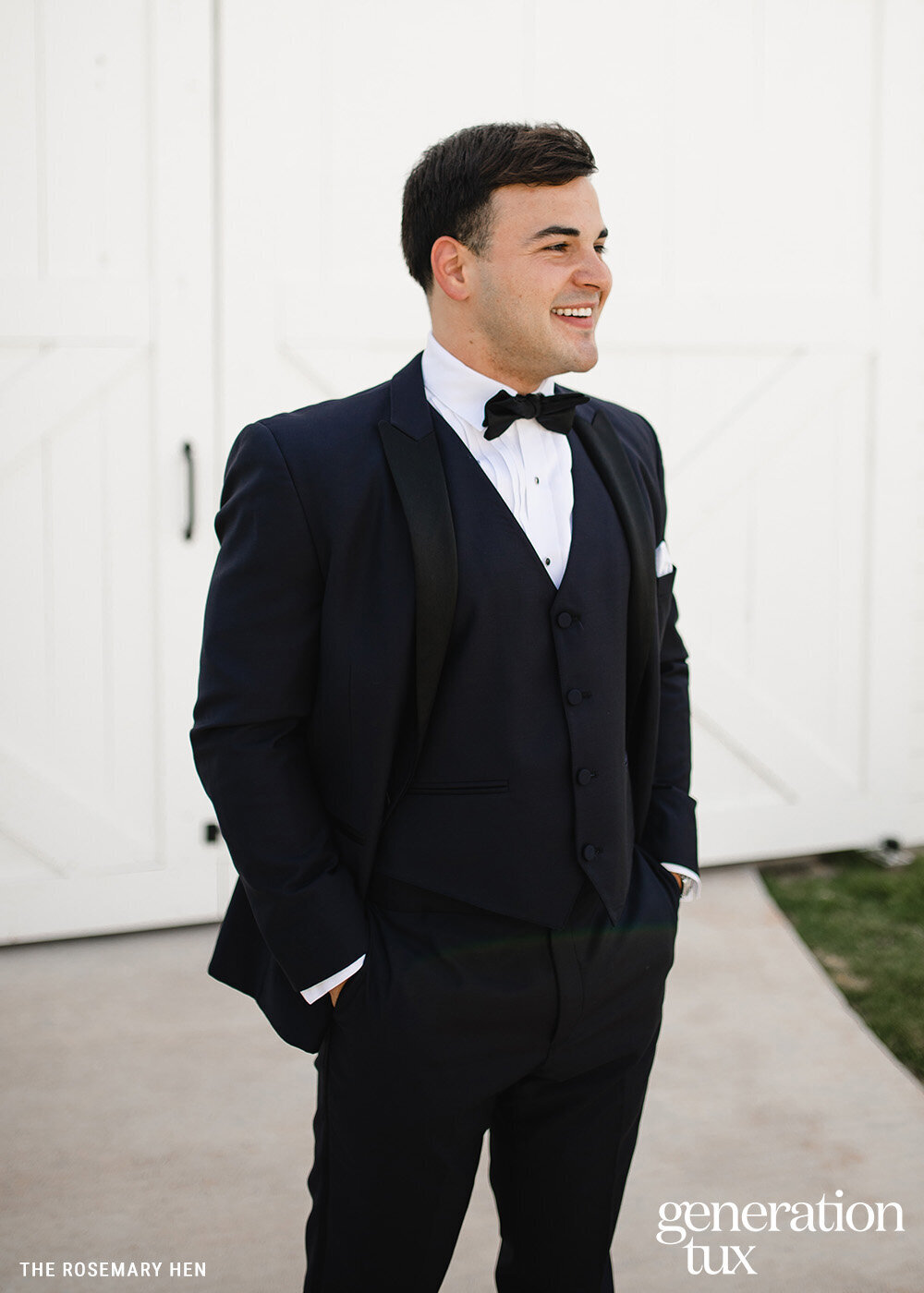 MIdnight Blue Peak Lapel Tuxedo Black Bowtie_Credit + Logo