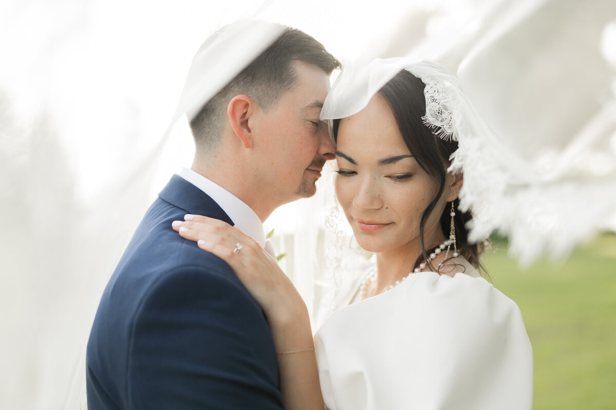 bride and groom veil photos