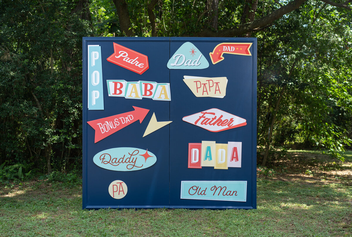 Navy blue Fathers Day backdrop design decorated with different dad names