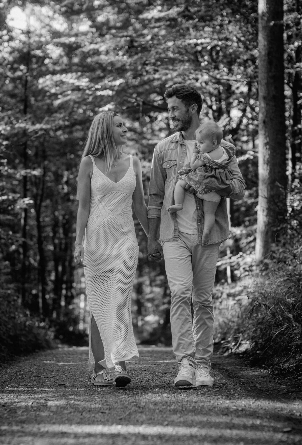 Walking family photography in the woods.