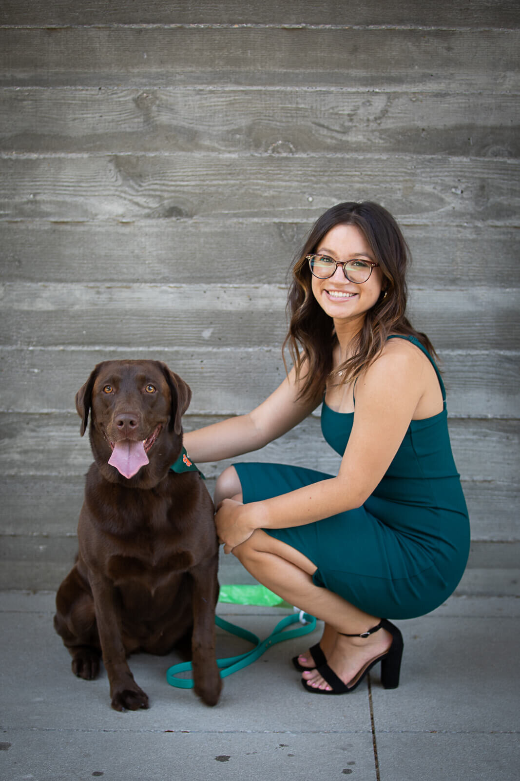 KS-Gray-Photography-Chocolate-Lab-and-woman-standing-together-in-front-of-stairs