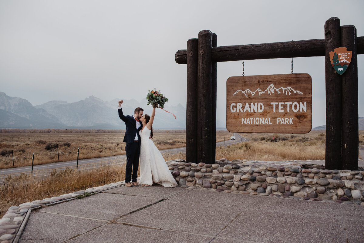 Photographers Jackson Hole capture couple celebrating Grand Teton elopement