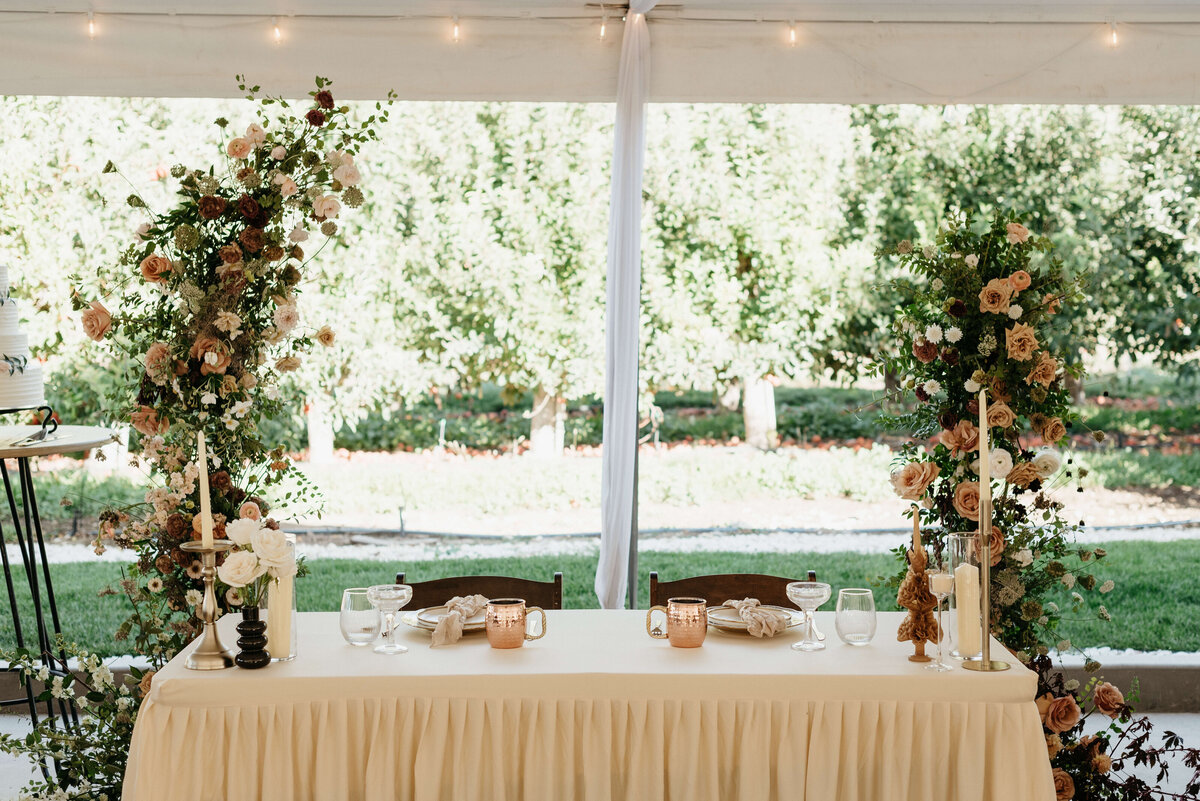 flower arch behind head table