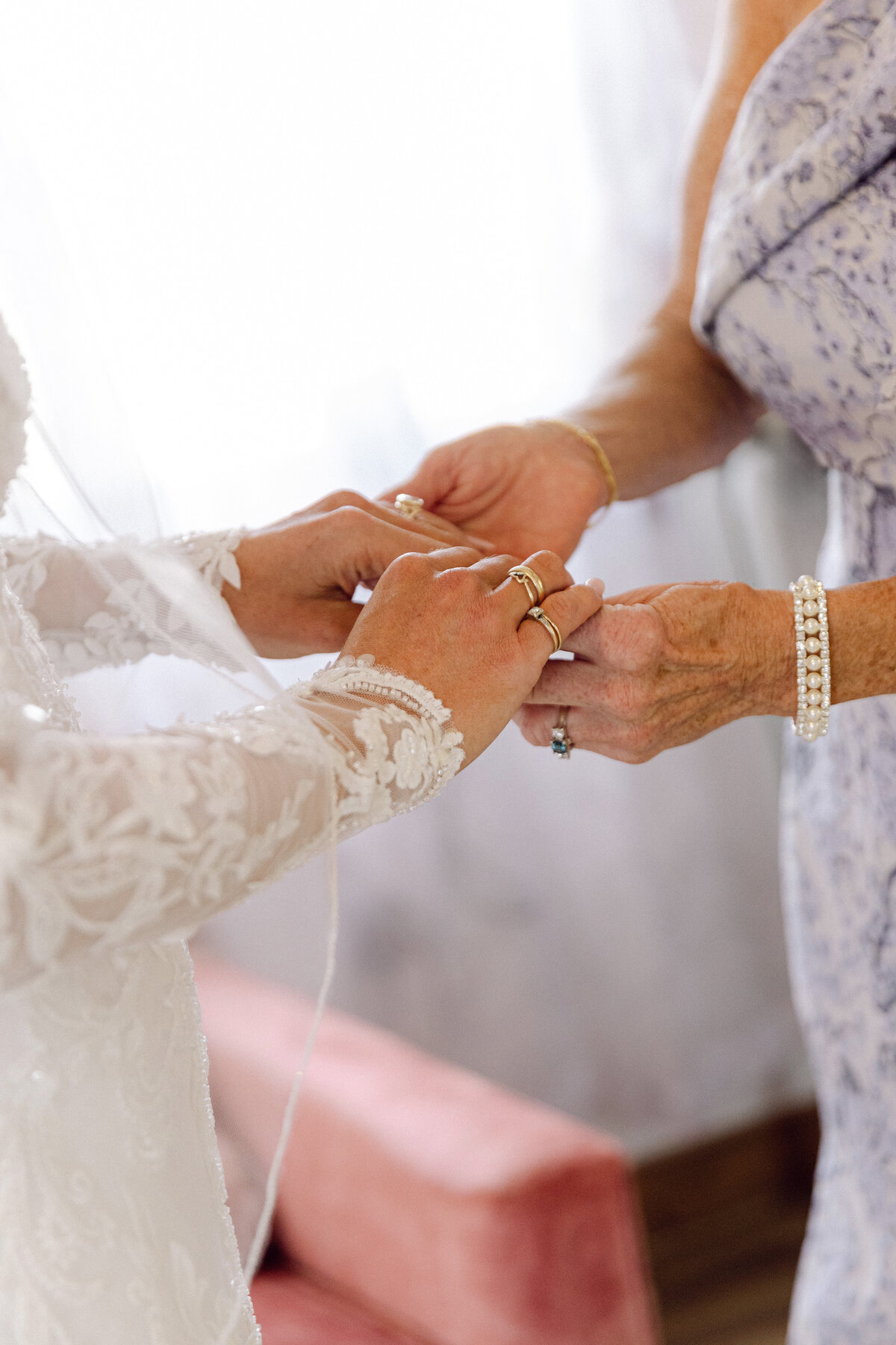 bride-holding-hands-with-family