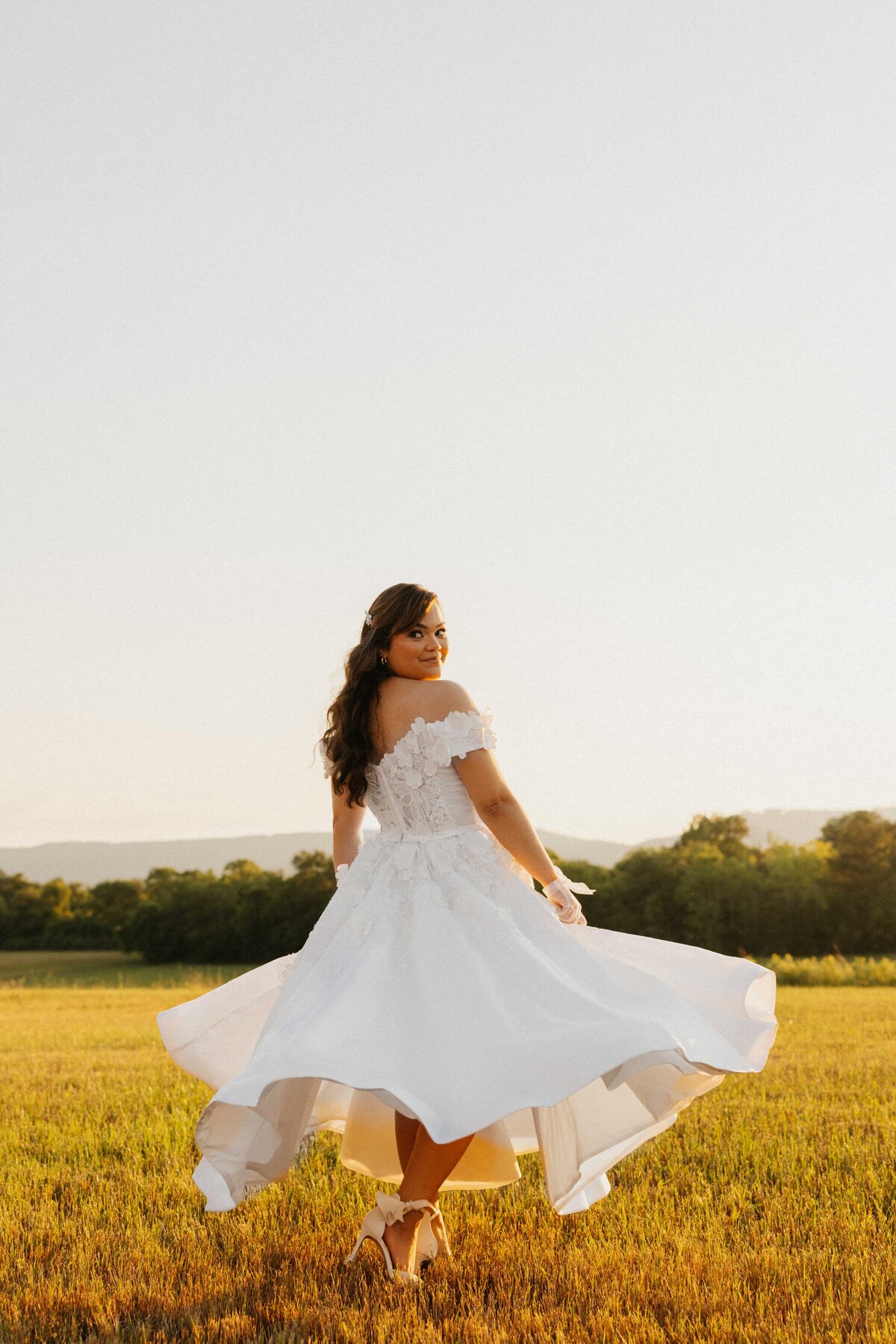 bride twirling in dress