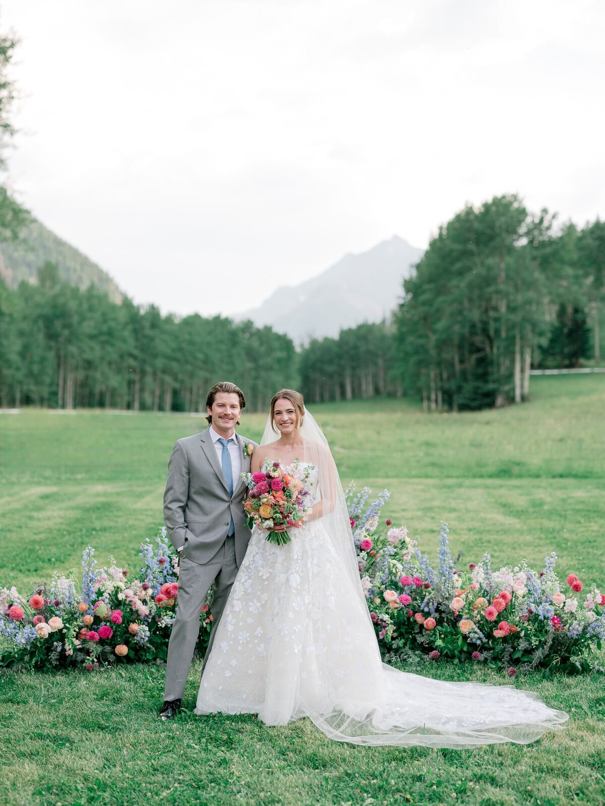 bride-and-groom-with-ceremony-arch