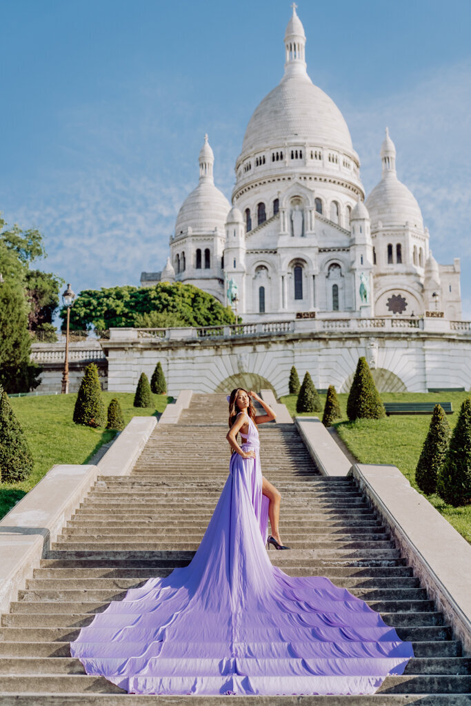 Sacre Coeur Paris portrait session with woman in purple evening gown on historic stairs