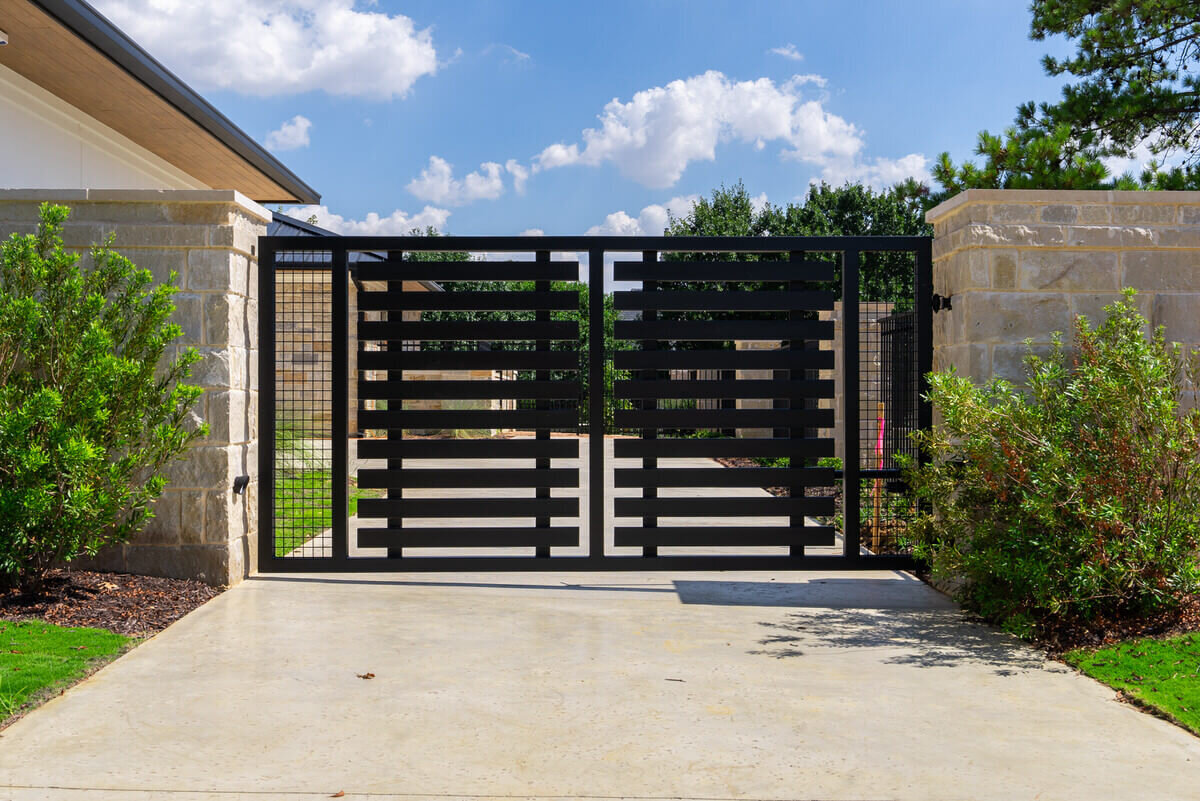 Custom gate design in luxury Colleyville home