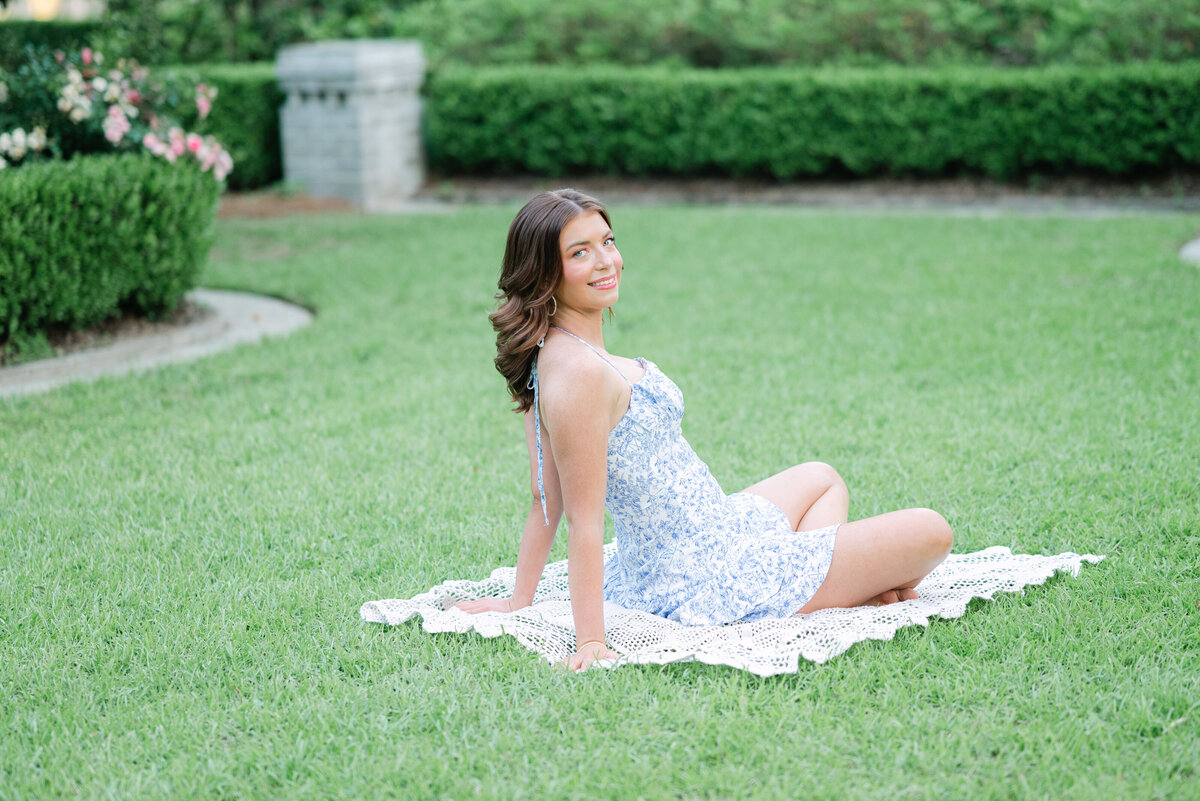 Simply beautiful senior session of teen sitting on blanket in Bainbridge by Photography by LV Hughes. 
