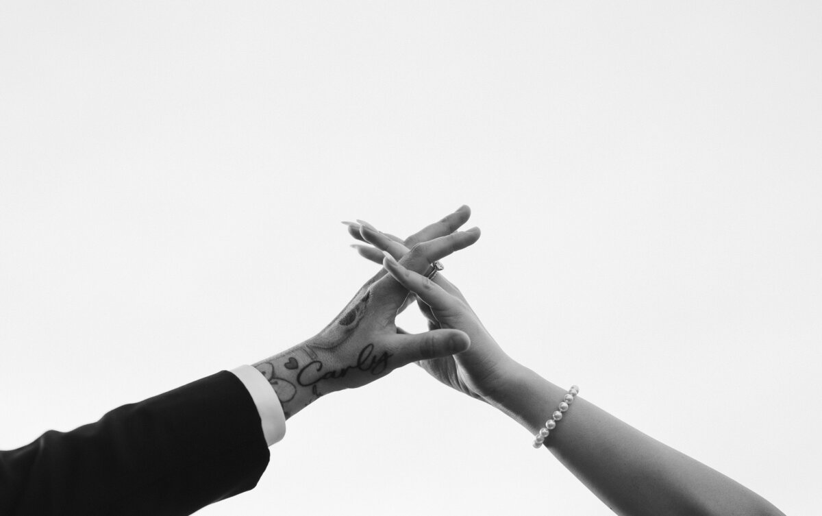 bride and groom tattoo hands