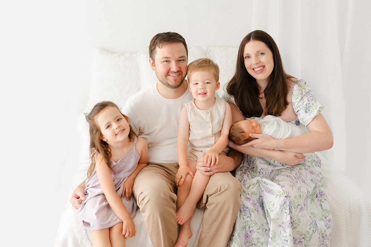 family in studio taken by family photographer boston ma​