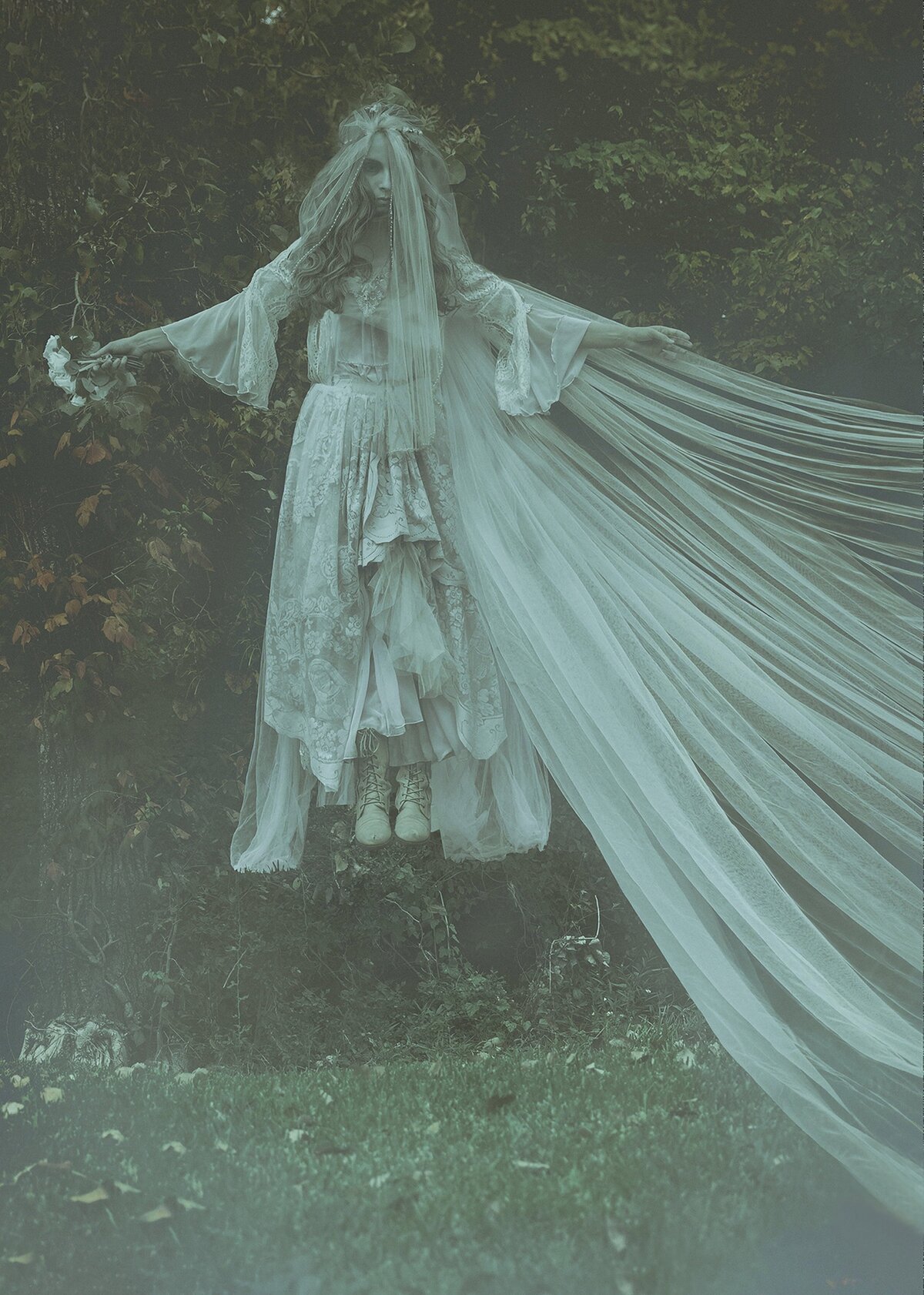 Ghost bride floating above ground 