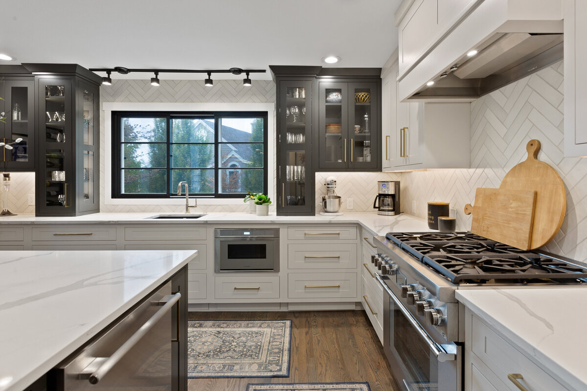 Modern kitchen of Manito Cottage renovation project designed by Spokane interior design firm Sarro Design.