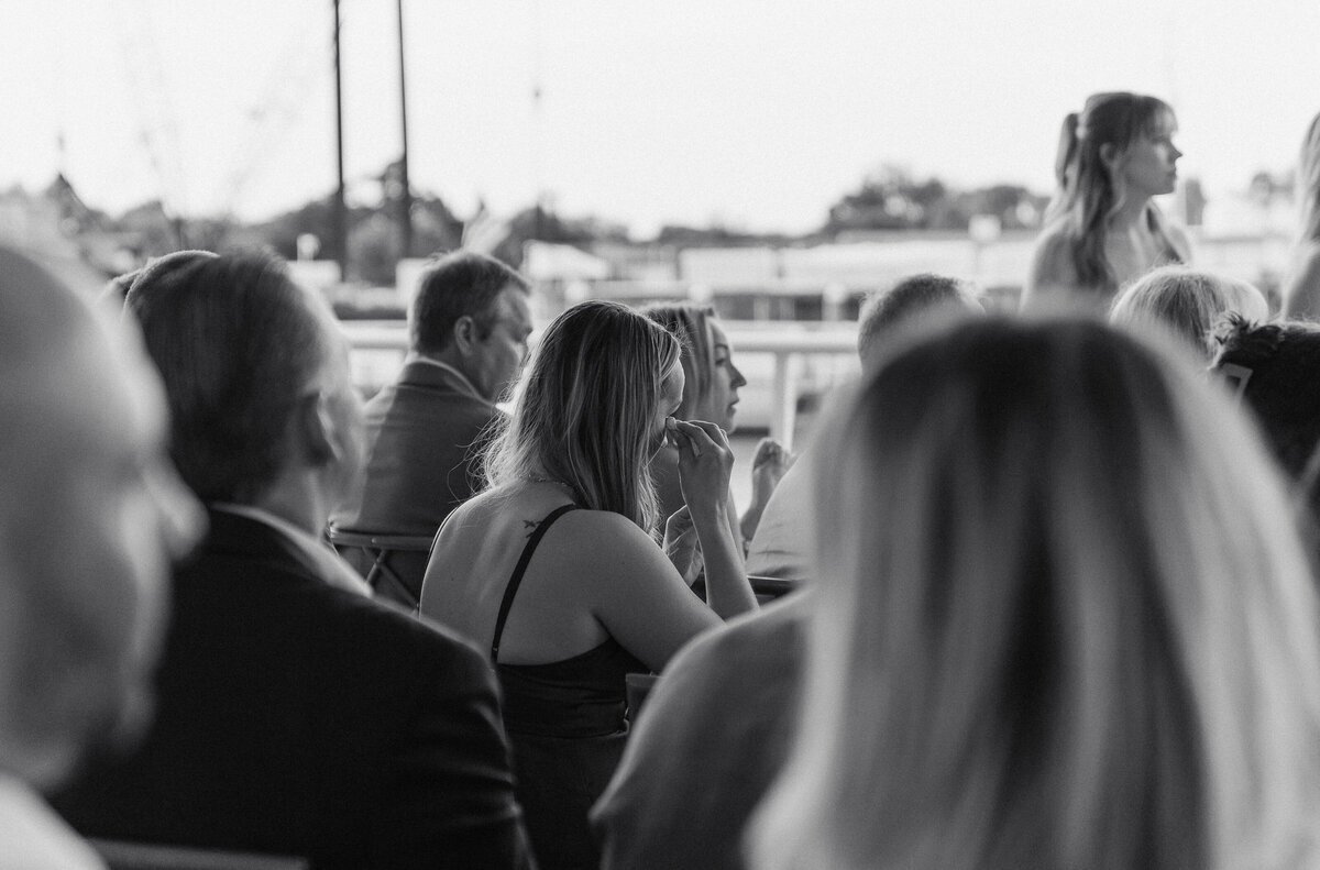 Guests crying during wedding reception taken by film wedding photographers