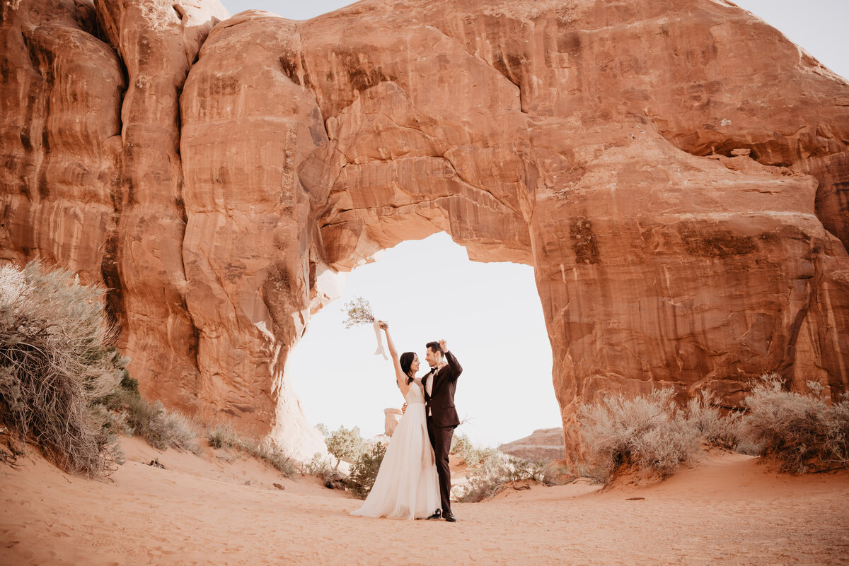 Utah elopement photographer captures couple celebrating recent marriage