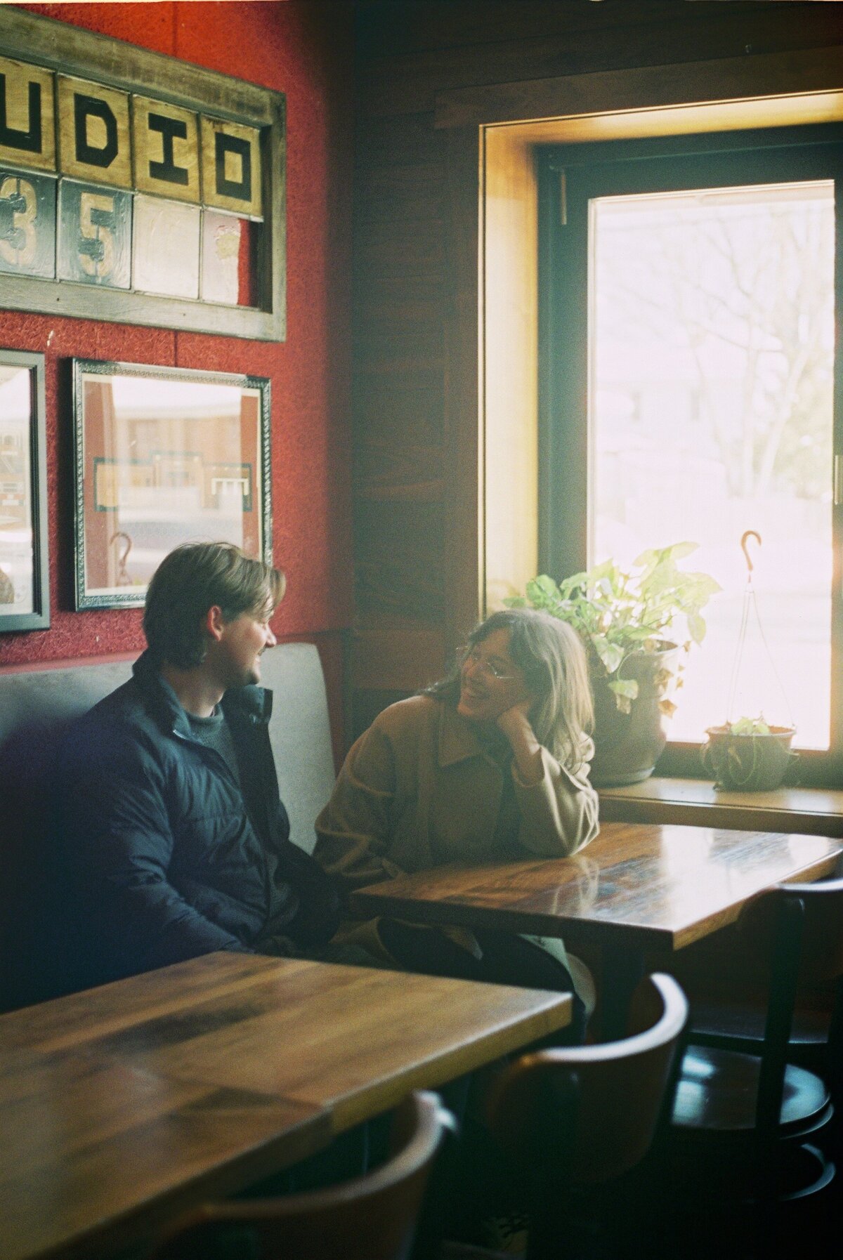 candid photo of happy couple in a cafe