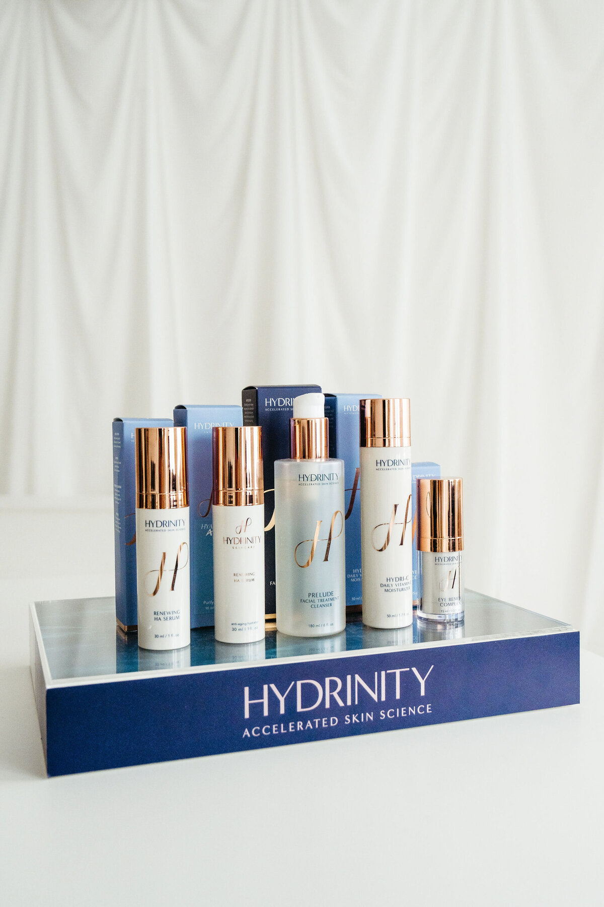 Product photography gallery featuring in-studio skincare and injectable offerings at Maxwell Aesthetics in Salem, Oregon. Includes medical-grade skincare lines like Epionce and Hydrinity, injectables such as Restylane and Sculptra