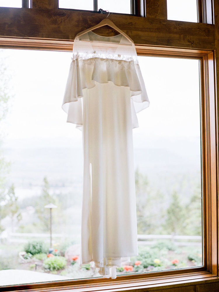 Wedding dress details for a horse ranch wedding in CO