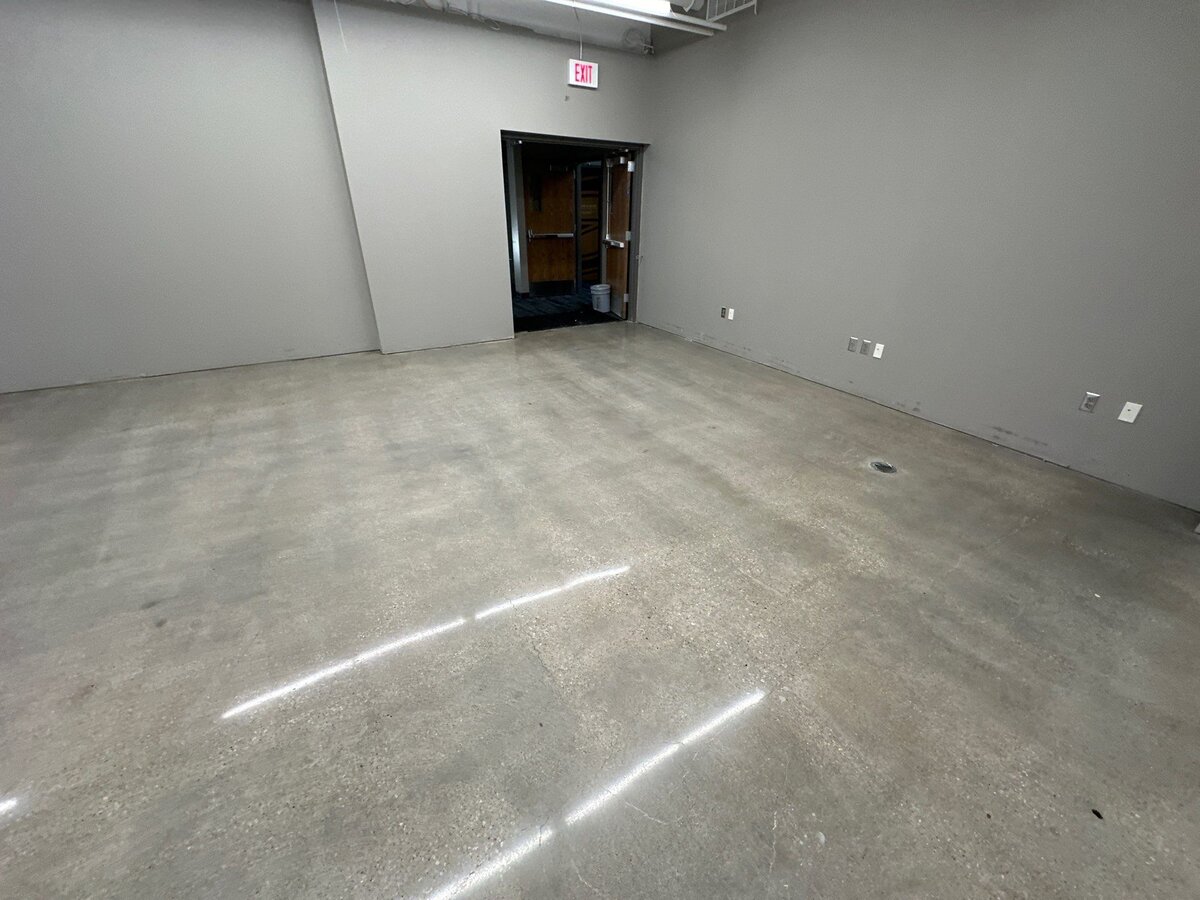 Polished concrete flooring for offices in DFW, showcasing sleek, durable surfaces ideal for modern commercial spaces.