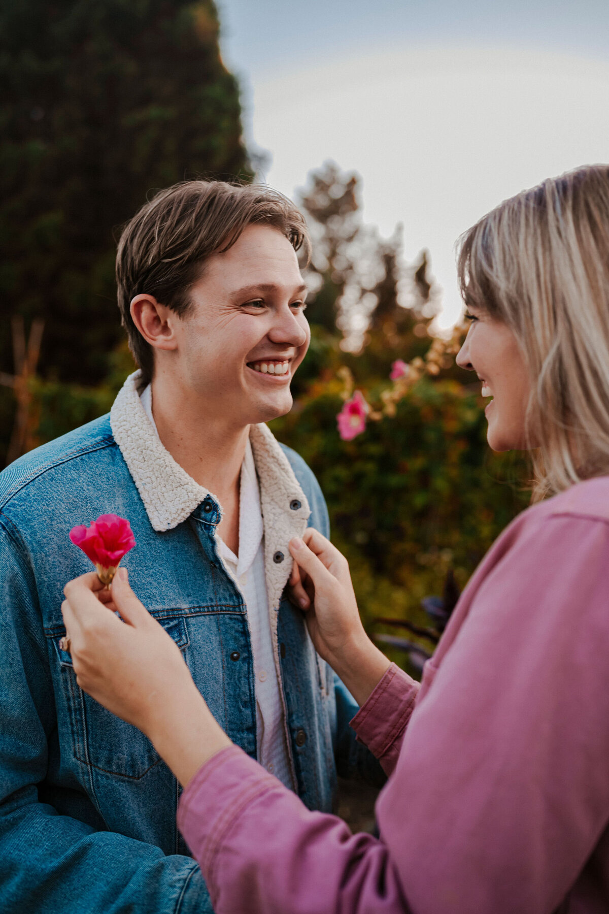 a man smiling at his fiance