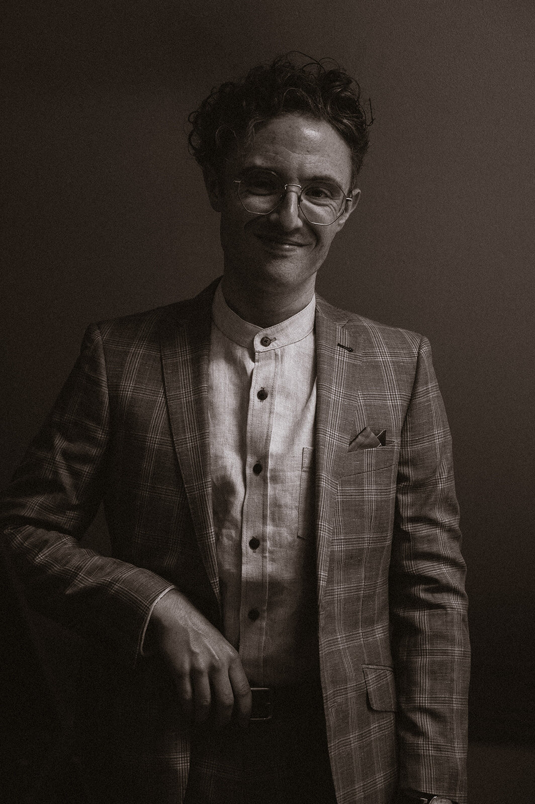 moody groom portrait black and white 