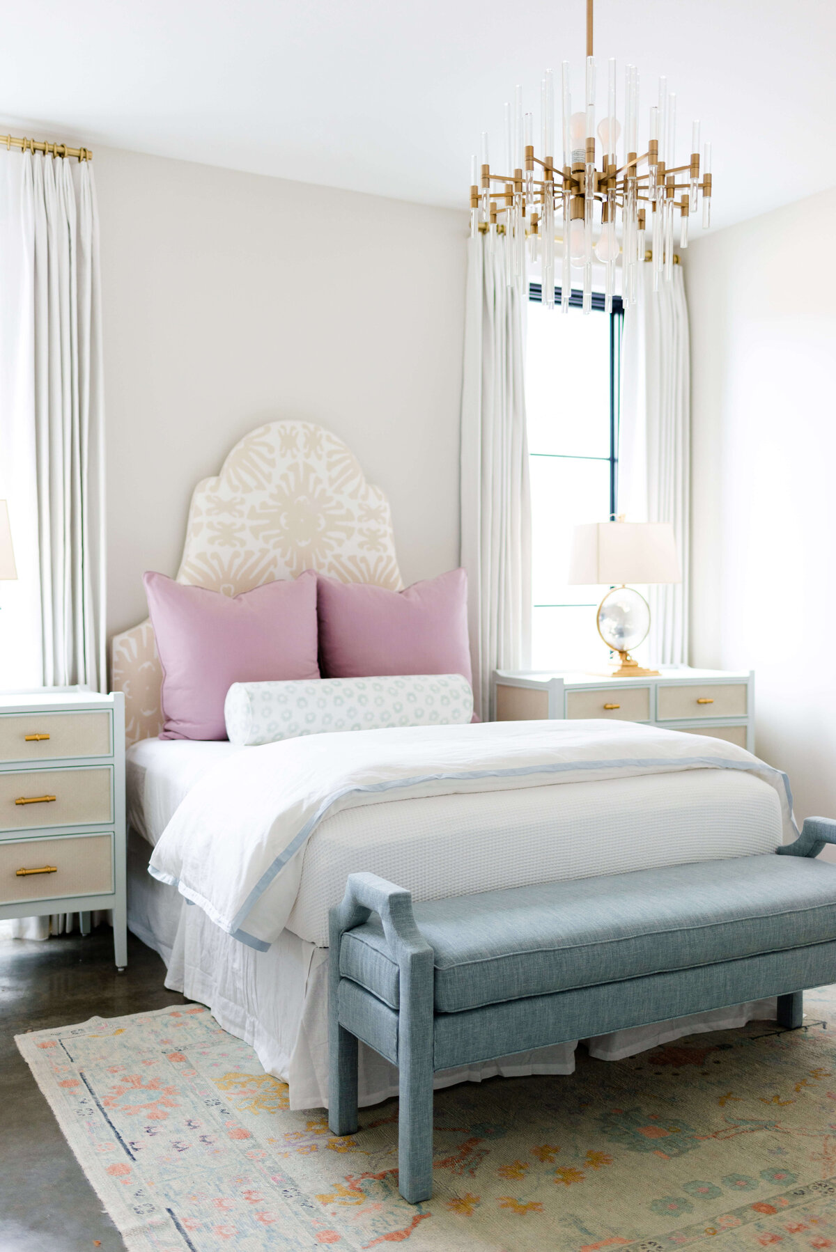 oyster creek studios building belt new build white bed with white bedspread and pink pillows in bedroom