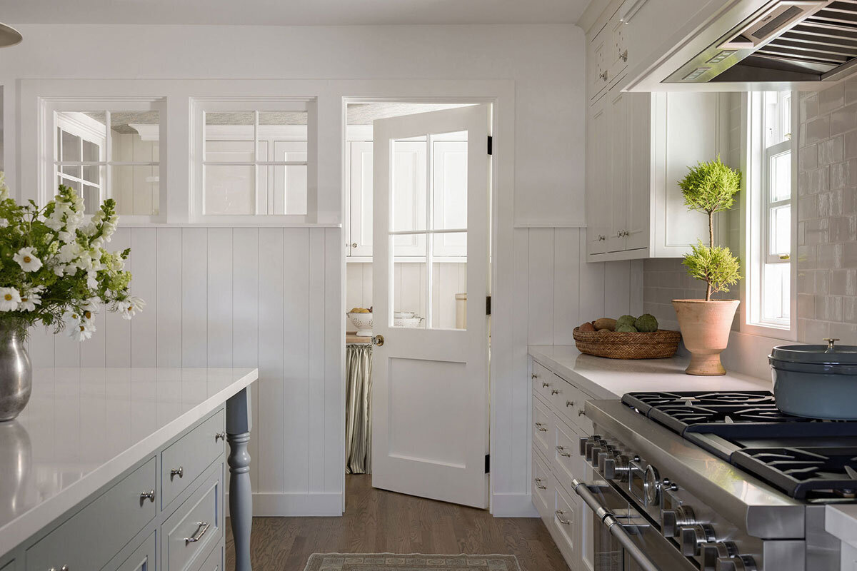 Kitchen with reclaimed wood touches and soft, livable luxury styling

