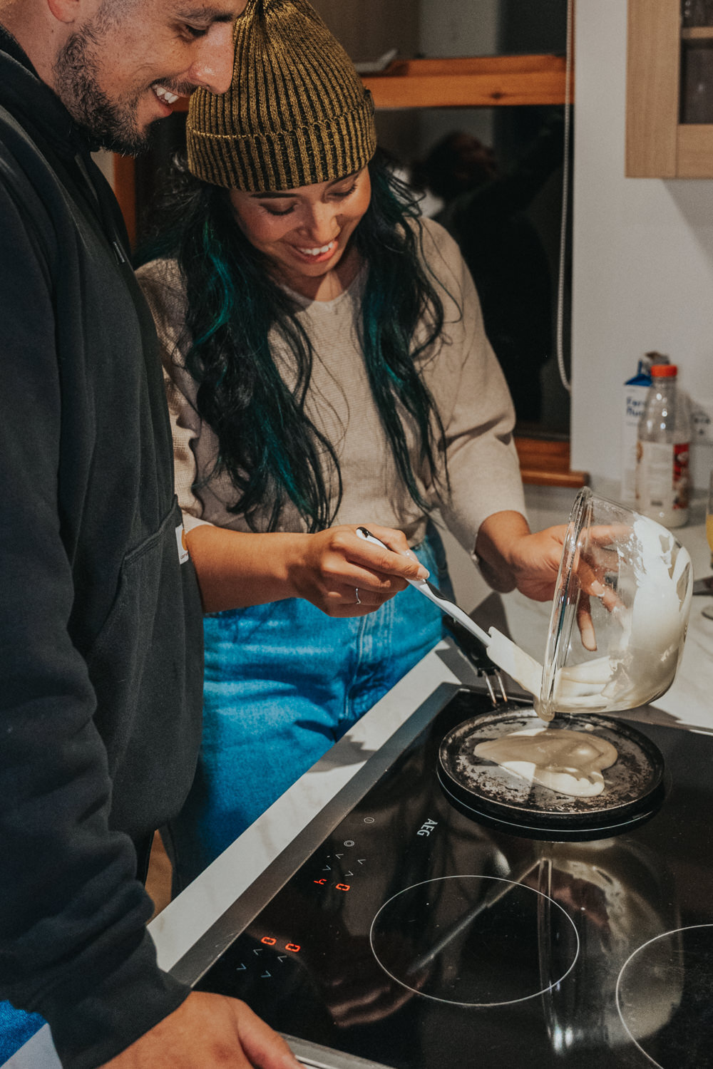 Newlyweds bake a cake together 