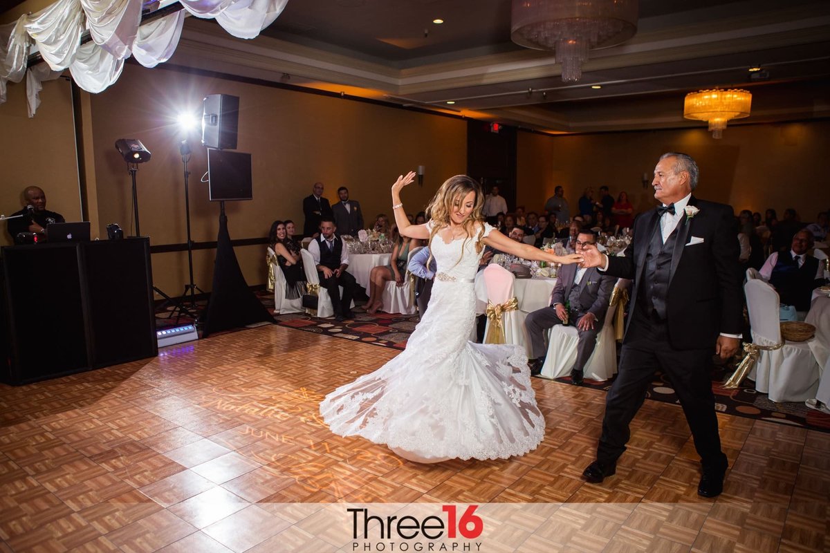 Bride dances her father at her wedding reception