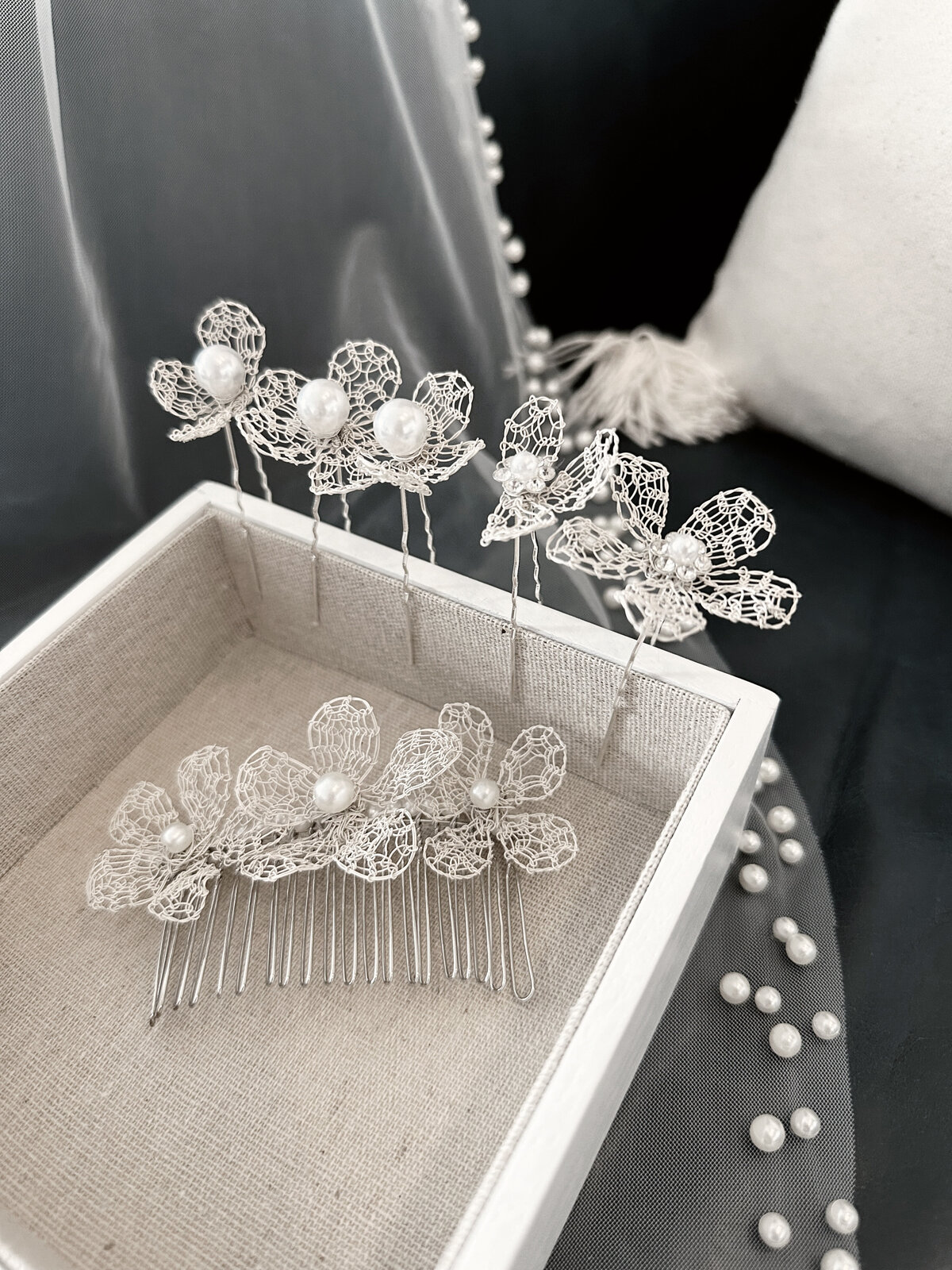 Handcrafted bridal hair jewelry, adding a classic touch to wedding hairstyles.