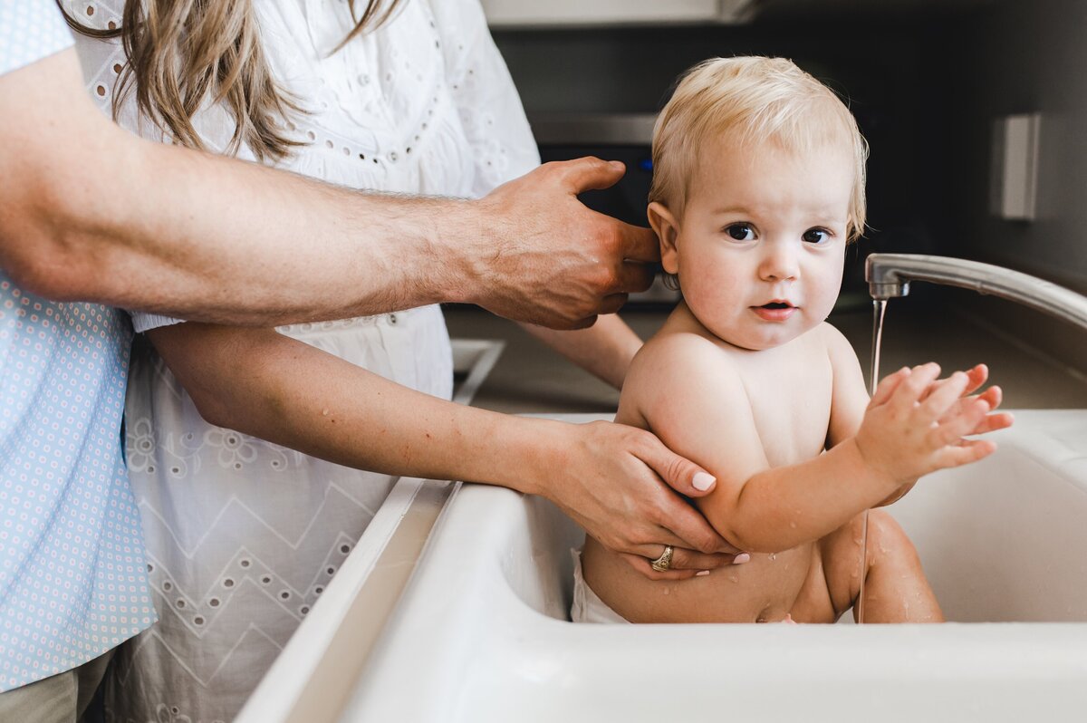 baby in the sink family session
