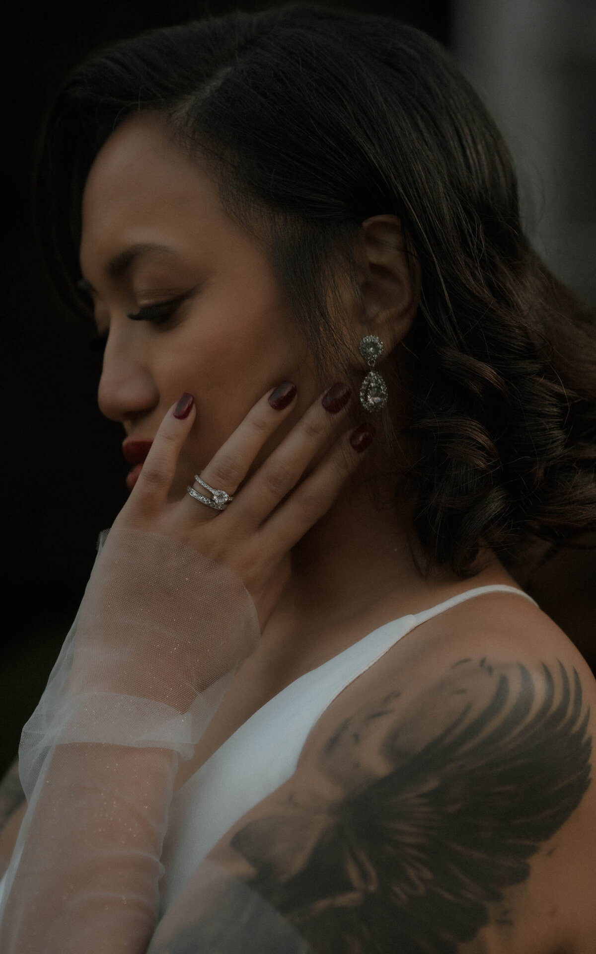The intimate moments of a bride preparing for her special day in timeless wedding photography.