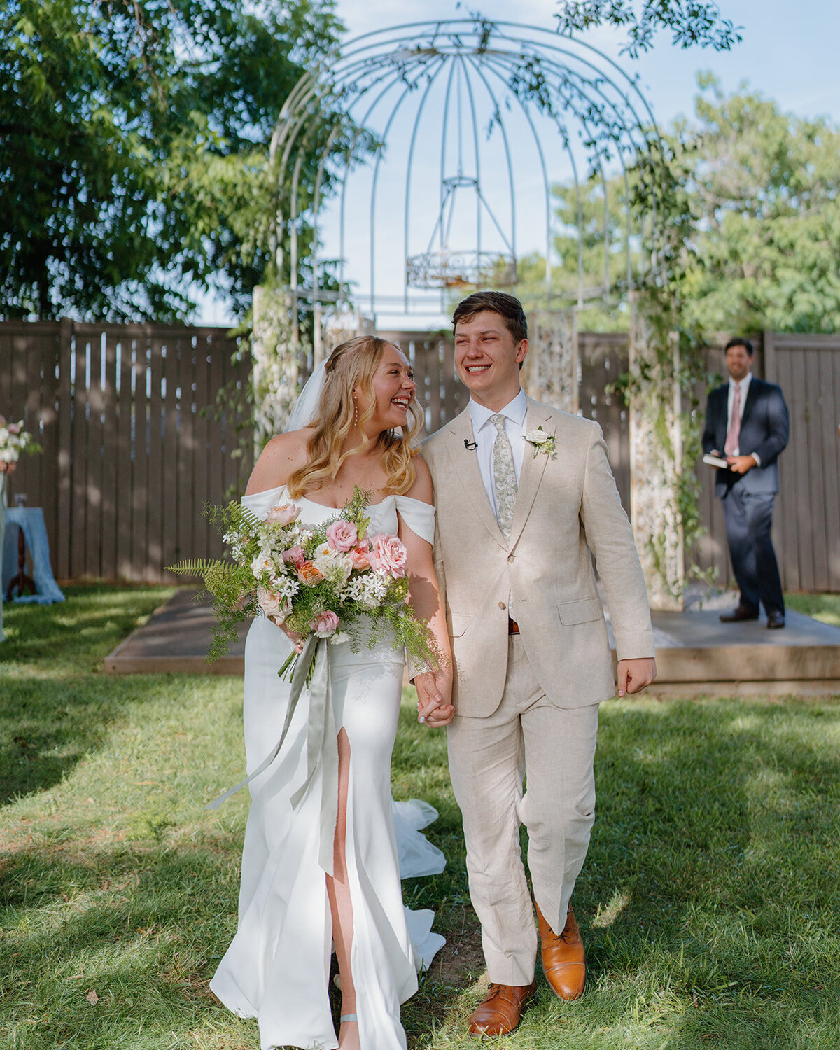 Bride and groom with bouquet designed by Abby Grace Florals at Easley SC wedding