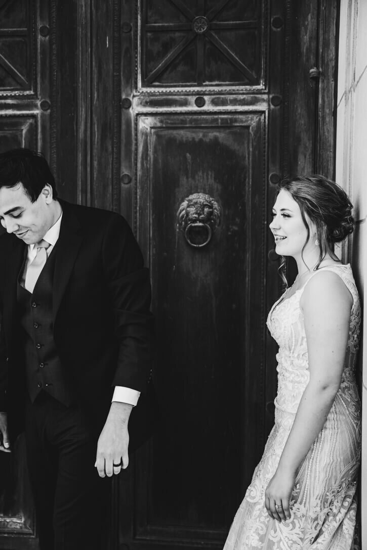 B&W moment between the Bride and Groom during couple portraits outside of the Dayton Masonic Temple.