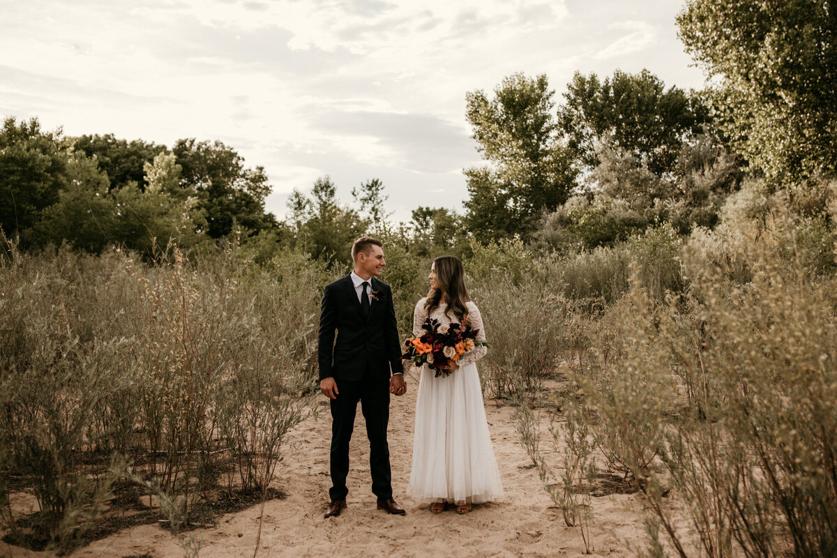 bride and groom standing in Albuquerque together