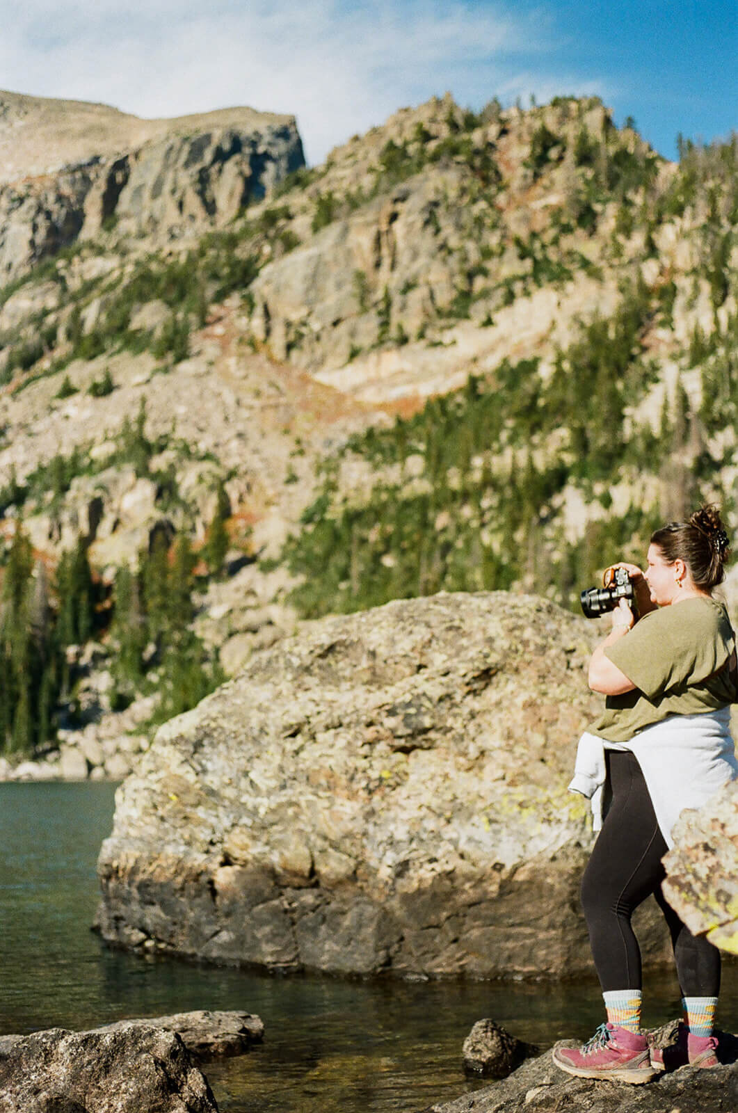 checking locations at an alpine lake