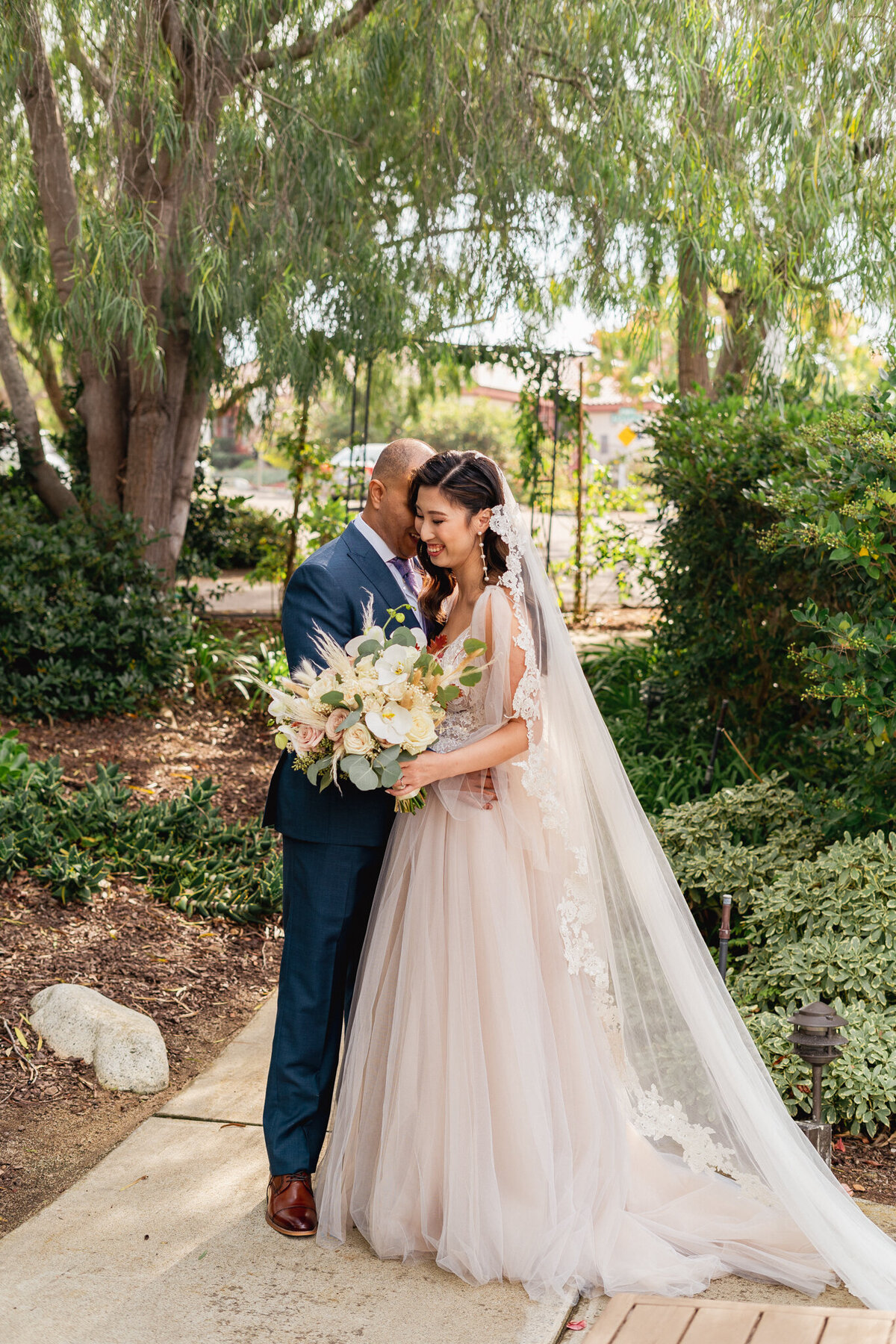 Bride and Groom sharing intimate moment
