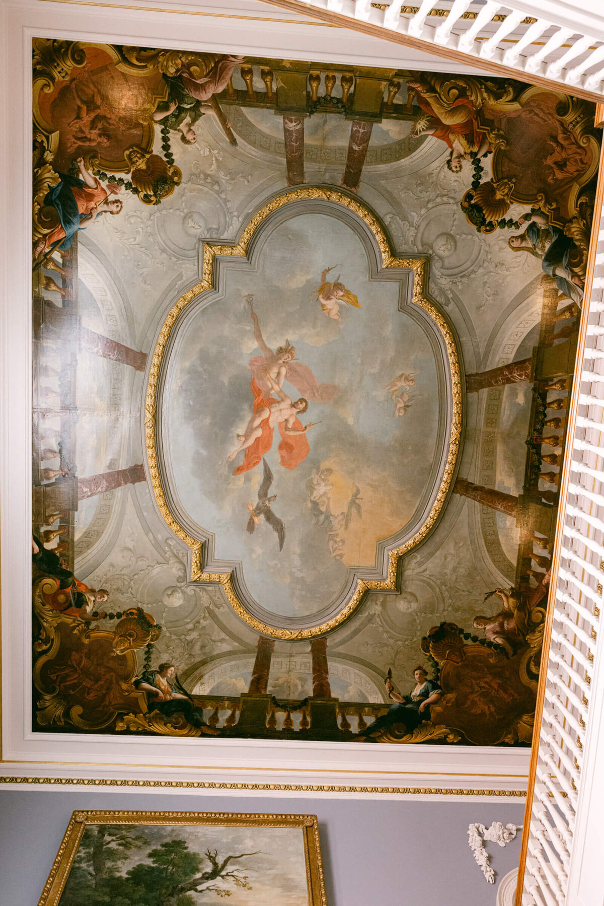 a wedding day photo of the artful painting on the ceiling of Luttrellstown Castle