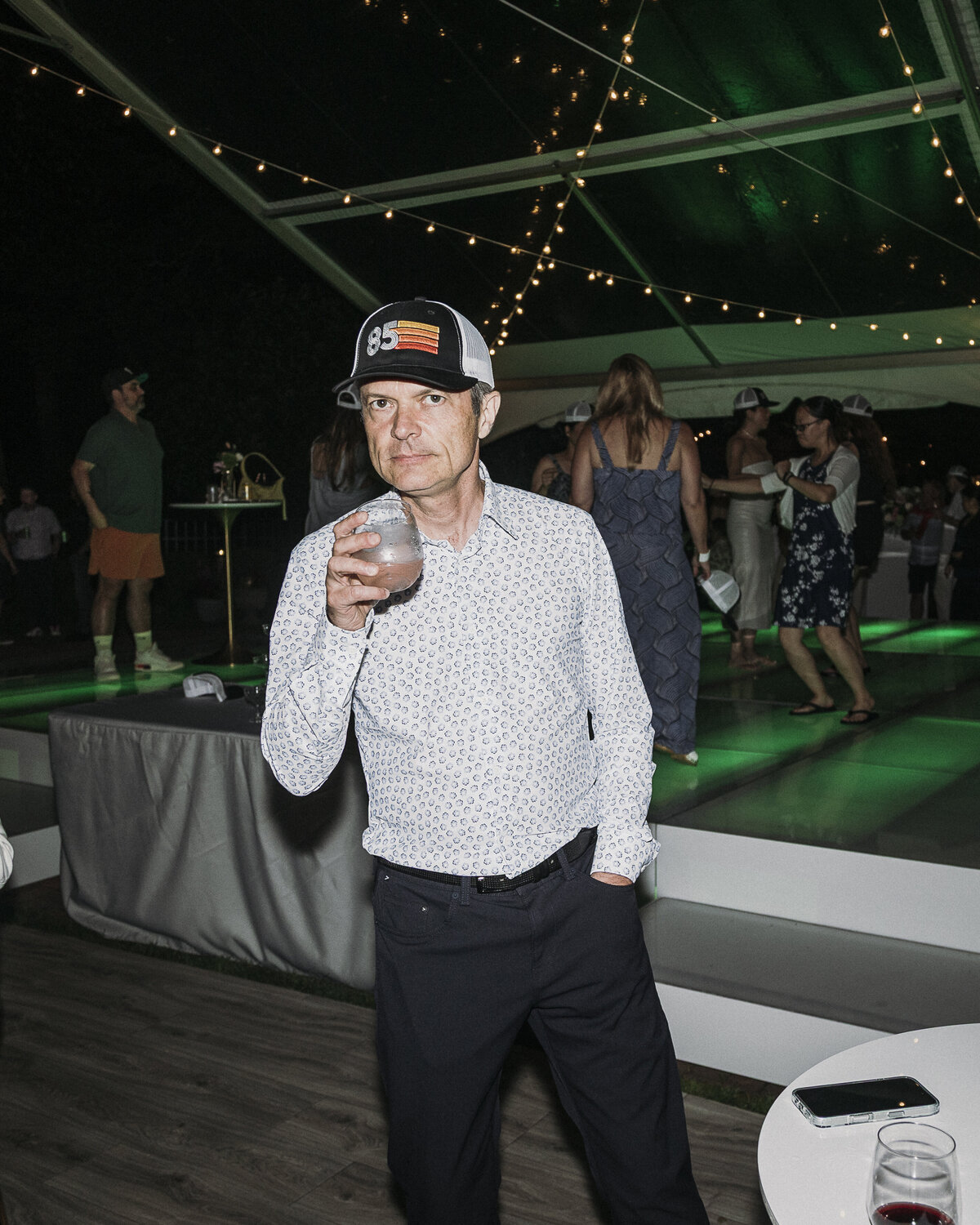 Photo of guest in private backyard party by Mira Park Photography NY based wedding photographer