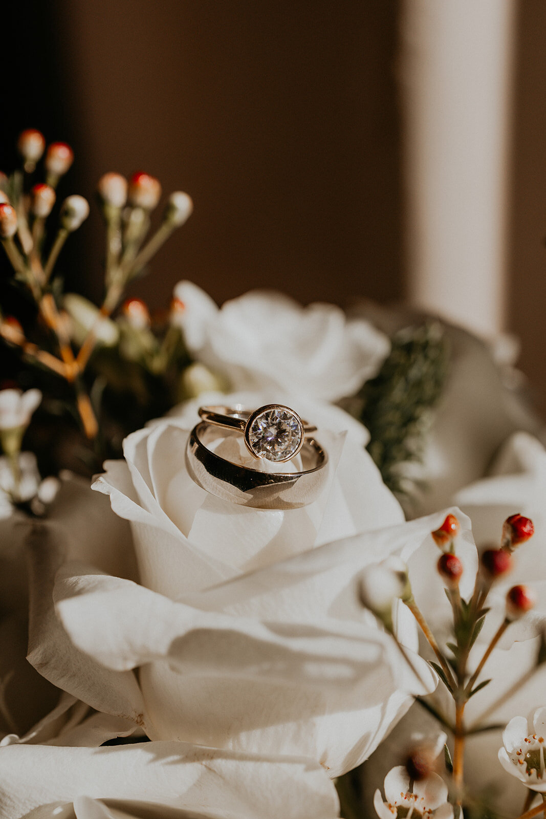 close up of rings on a bouquet
