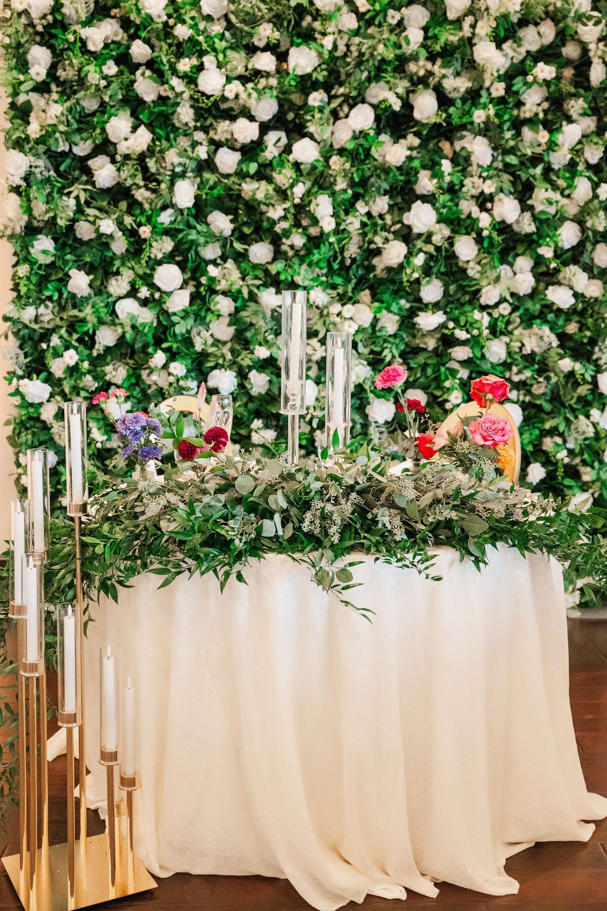 sweetheart table at The Lake Club Ohio with lots of greenery and white flowers