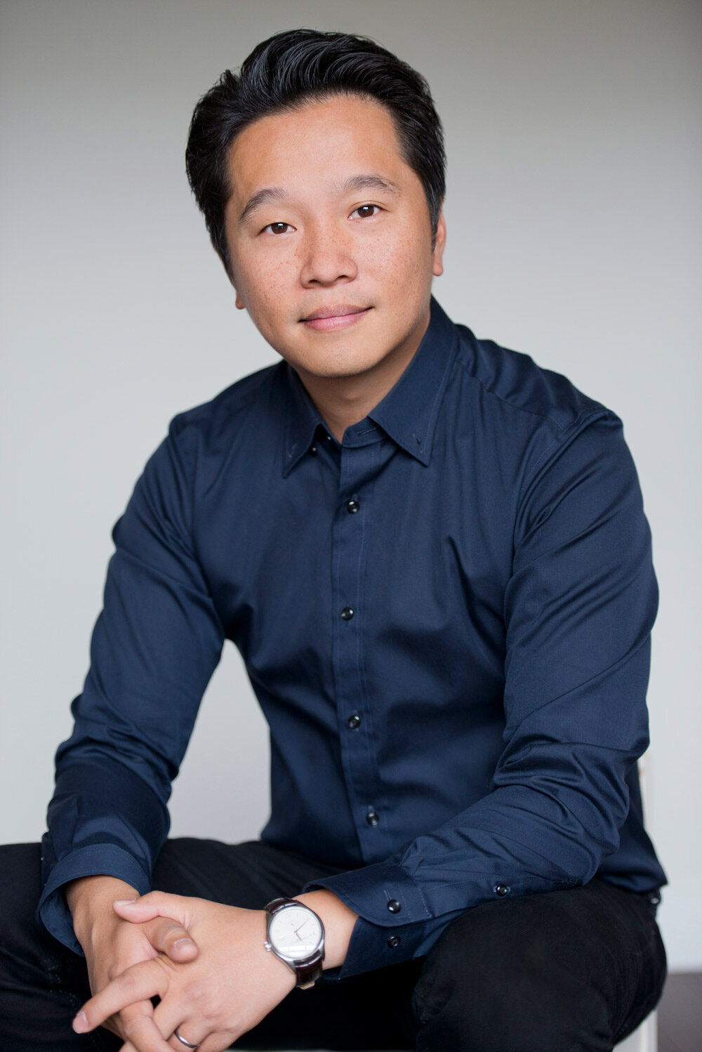 male asian business owner headshots