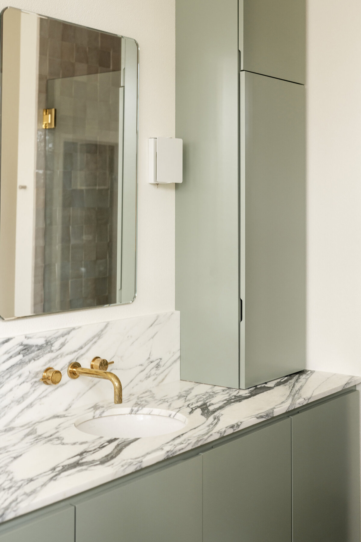 house-franc-hyde-park-bathroom-remodel-historic-home-design-green-vanity-linen-closet-arabescato-marble-countertop-historic-neighborhood-austin-texas