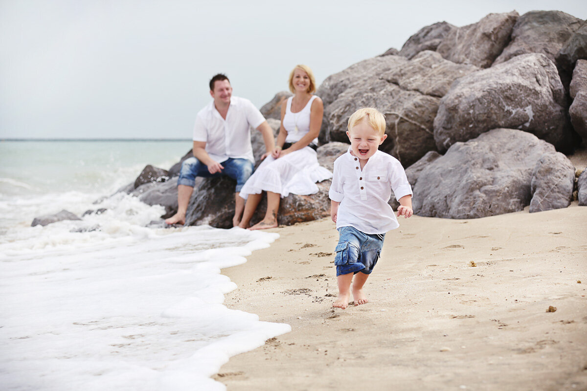 boy-running-on-the-beach-in-victoria
